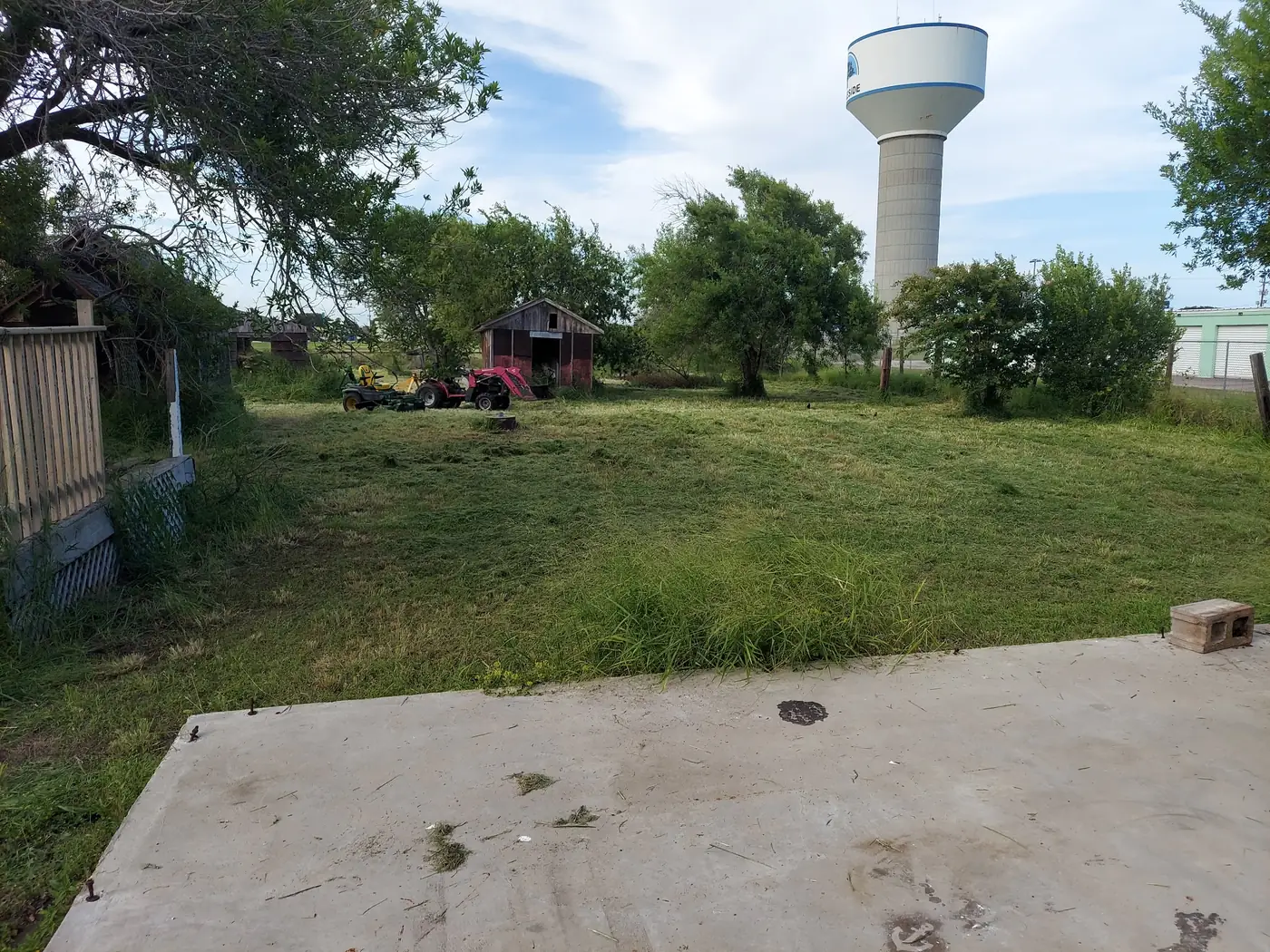 Overgrown lot cleared with a tractor — Ingleside acreage
